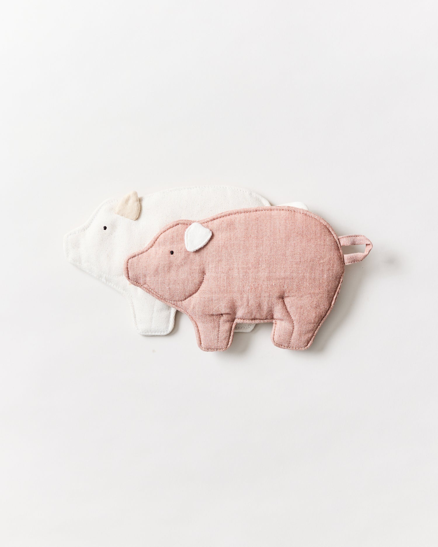 Natural Piglet Hot Pads grouped together