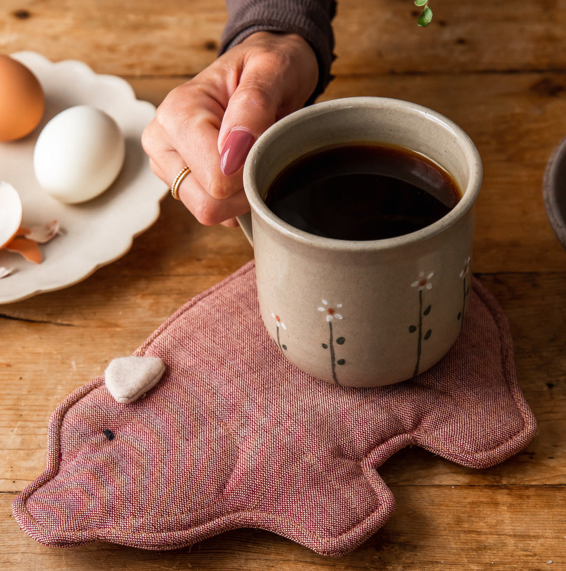 Piglet Hot Pad styled on a table