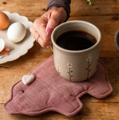 Piglet Hot Pad styled on a table